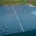 Floating solar panels in a large field.