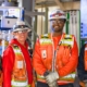 Four Oregon-Columbia Chapter of NECA electrical contractors in safety gear.