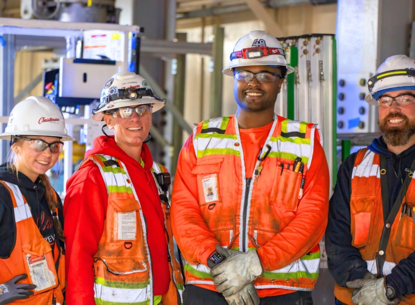 Four Oregon-Columbia Chapter of NECA electrical contractors in safety gear.