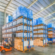Large warehouse with boxes stacked to the ceiling.