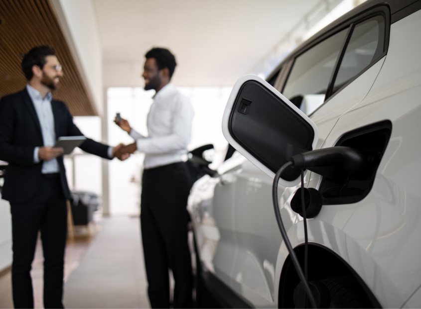 White electric vehicle in showroom.